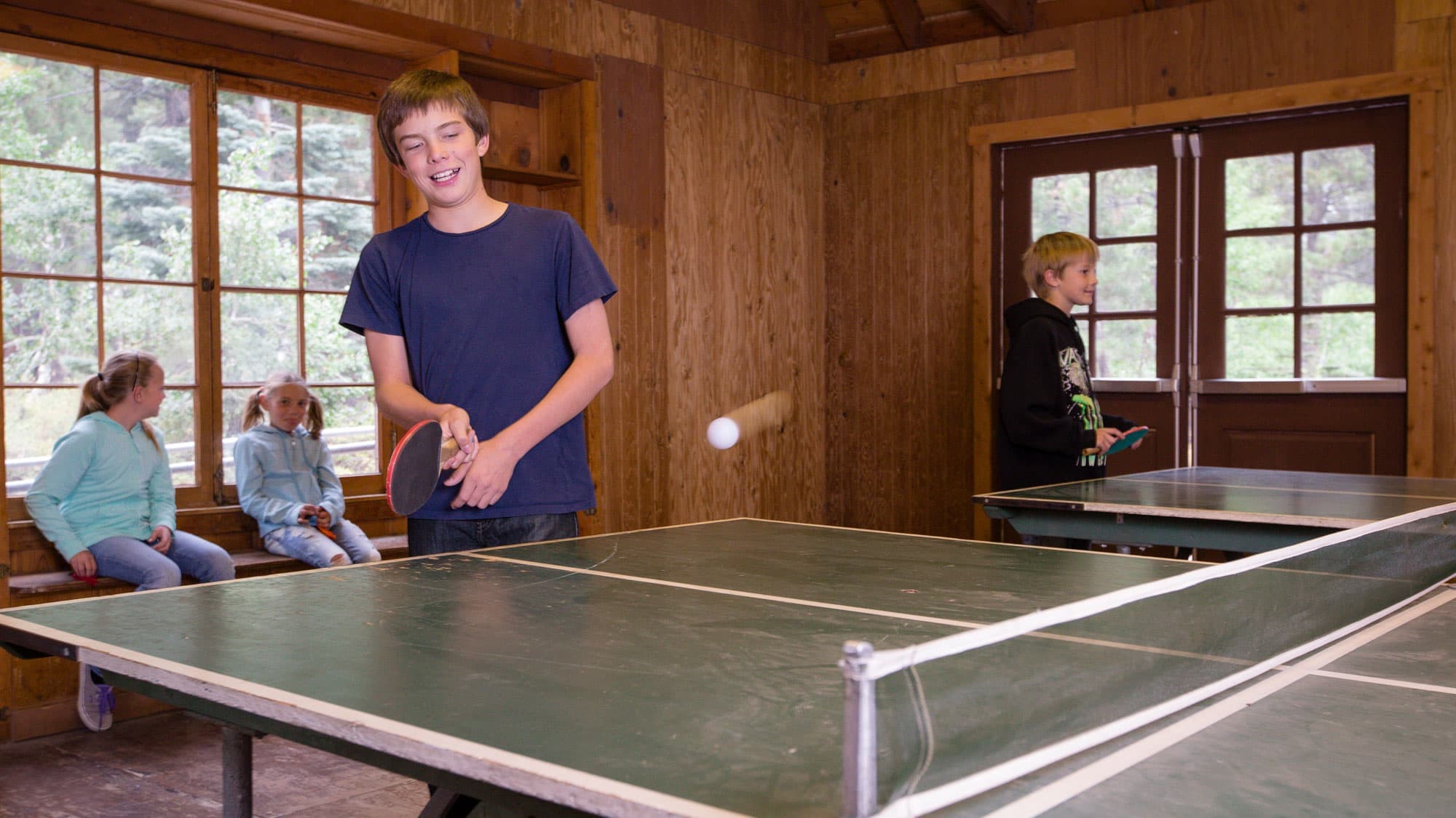 Kids playing ping pong