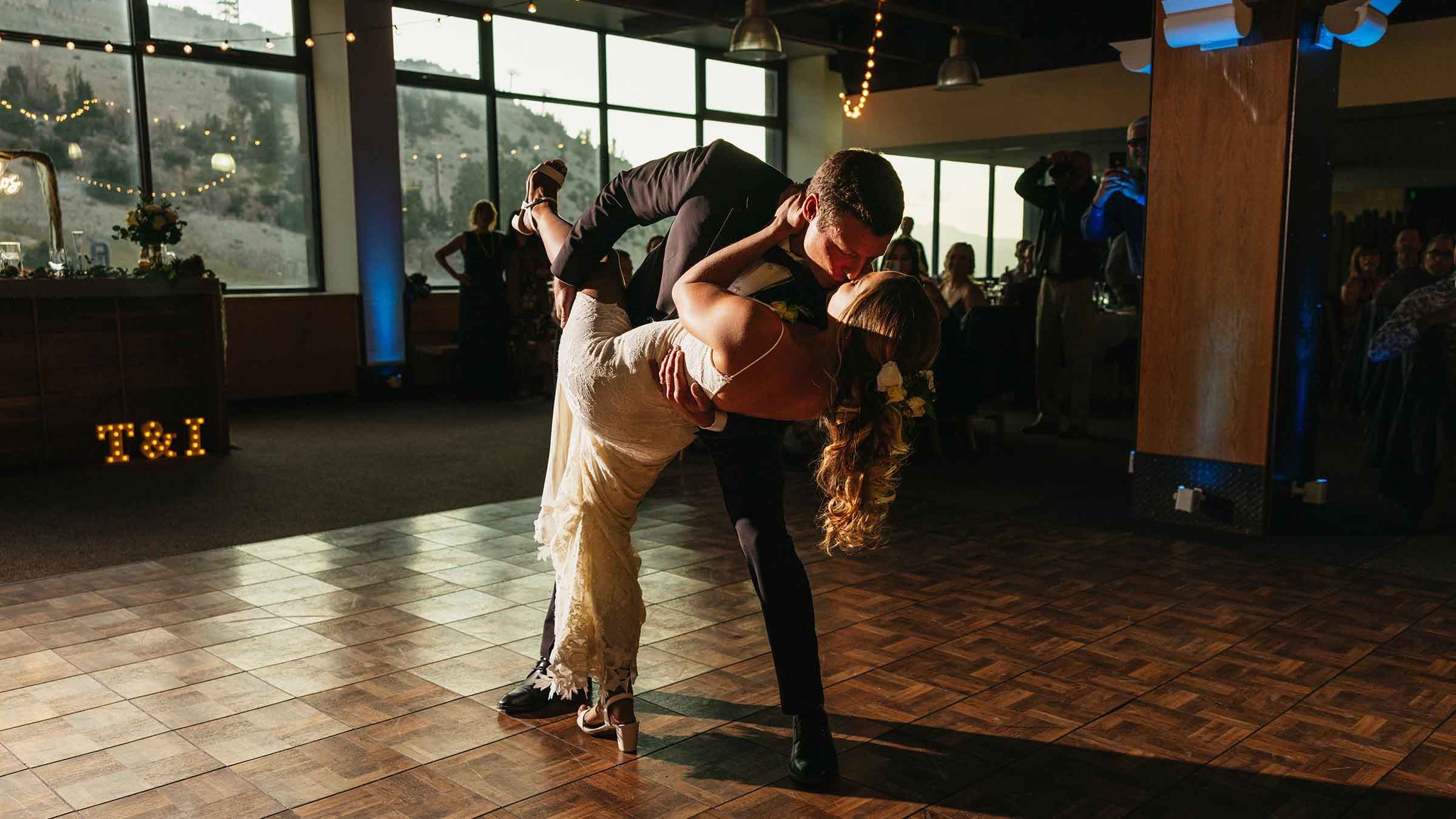 A couple kissing in the McCoy Station wedding venue